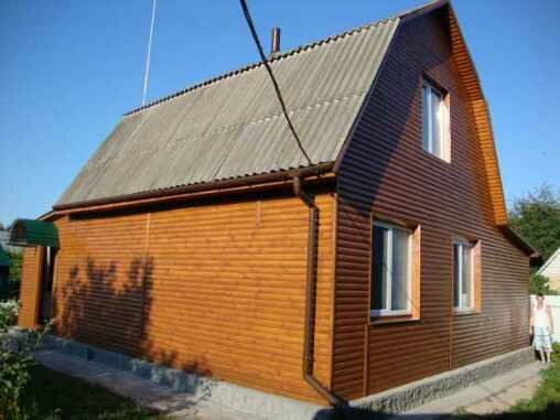 Деревянный дом из бруса, иногда, делают в стиле ретро